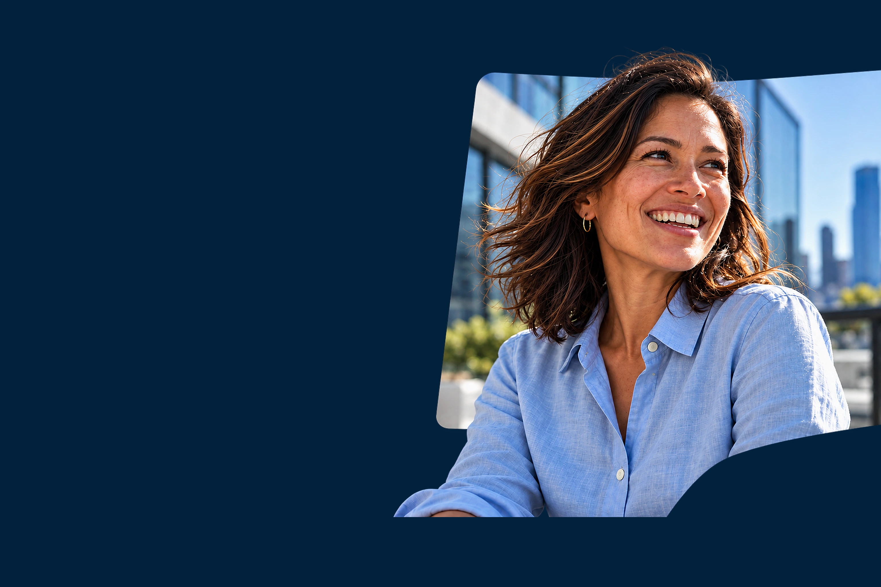 A smiling professional outside her office building